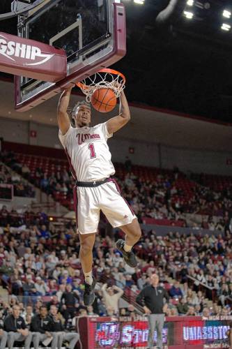 UMass sophomore forward Daniel Hankins-Sanford (1) jams home fast-break dunk in the first half of the Minutemen’s 75-67 loss to St. Bonaventure on Saturday afternoon at the Mullins Center.