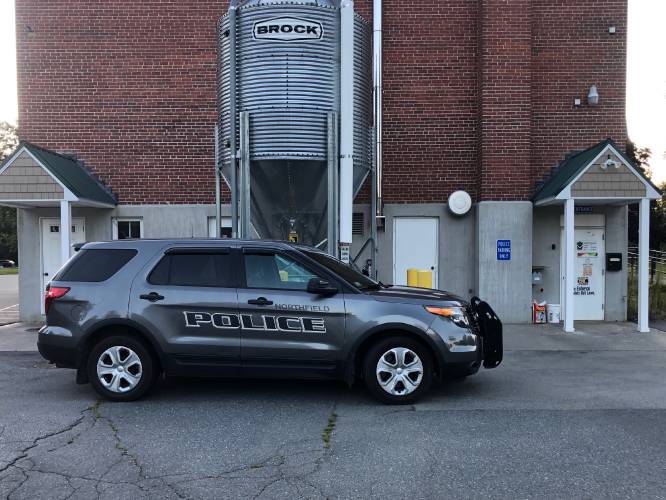A police cruiser parks outside the entrance to the Northfield Police Station, located in the basement of Northfield Town Hall at 69 Main St.