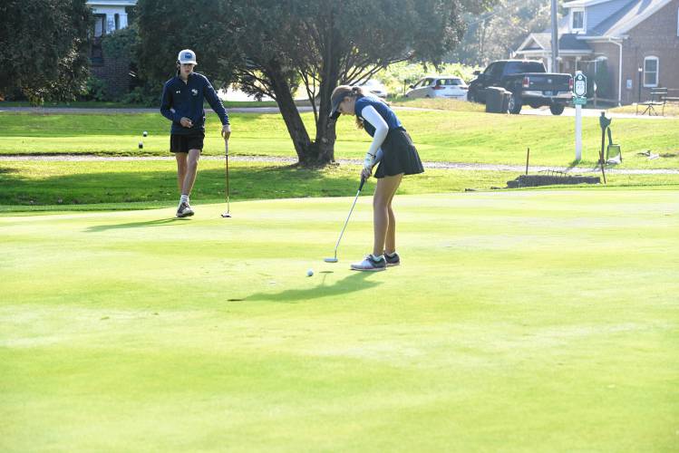 Hopkins' Ryley Regan putts on Hole No. 1 in a match against Franklin Tech at Thomas Memorial on Thursday. 