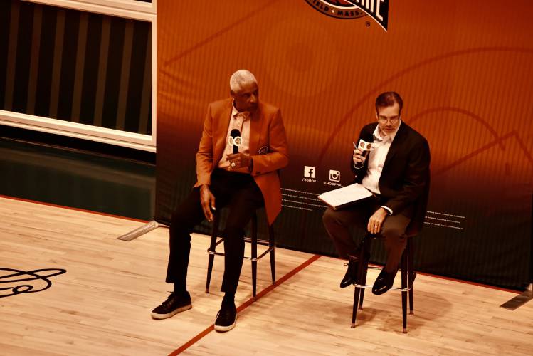 UMass great and Hall of Famer Julius Erving, left, spoke before a packed house at the Naismith Memorial Basketball Hall of Fame in Springfiel