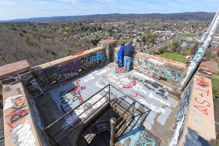 A visiting couple said they enjoyed the view but not the graffiti at Poet’s Seat Tower in Greenfield.