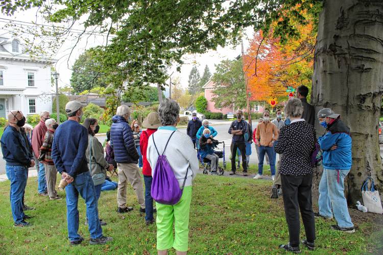 Community members participate in a walking tour of Greenfield in 2021 highlighting local ties to the Underground Railroad and abolitionist movement.