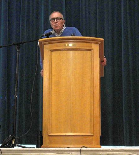 Moderator Christopher Woodcock during the Special Town Meeting in Orange on Thursday.