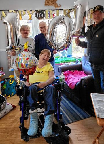 Three generations recently celebrated the 101st birthday of Orange resident Roy Bombard, back center, on March 3.