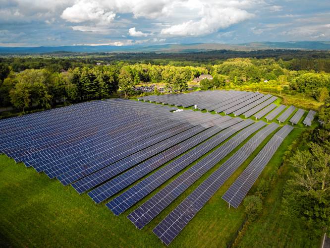 A field of solar panels along West Bay Road in Amherst. Cinda Jones, president of W.D. Cowls, said at the forum that spot projects like this one placed amid the region’s forested areas are a sound way to site solar.
