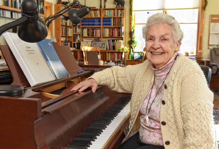 Composer Alice Parker, pictured at her piano in her Hawley studio in 2016, has died at the age of 98.