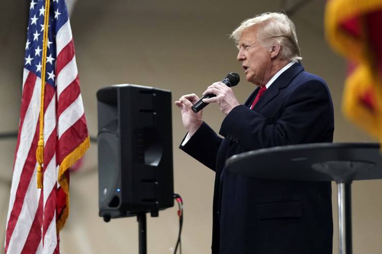 Republican presidential candidate former President Donald Trump speaks at a caucus site at Horizon Events Center, in Clive, Iowa, Monday, Jan. 15, 2024.