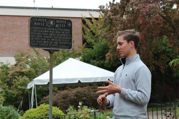 Greenfield High School student Kris Bostrom, seen here standing in front of the Greenfield Public Library in 2021, was one of the tour leaders highlighting local ties to the Underground Railroad and abolitionist movement.