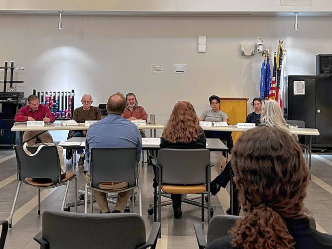 Greenfield Planning Board members listen to a presentation by Clinical & Support Options (CSO) staff about their plan for a temporary shelter on Arch Street during a meeting at the John Zon Community Center on Thursday.