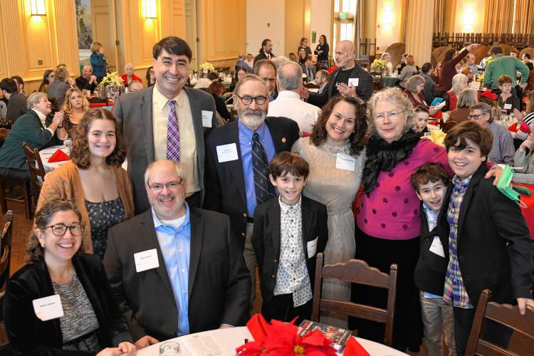 Greenfield Recorder Citizen of the Year Ben Clark with his family during the Citizen of the Year ceremonies at the Franklin County Chamber of Commerce’s holiday breakfast at Deerfield Academy Tuesday morning.