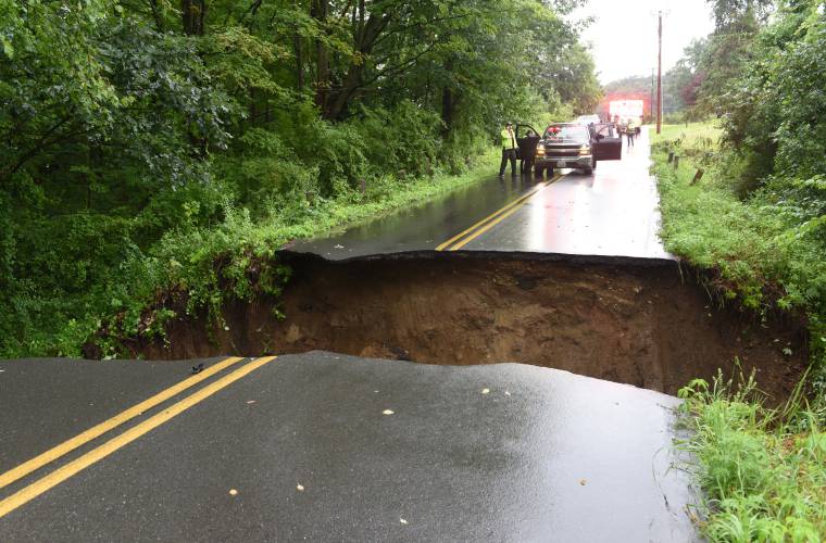 Heavy rain washed out this section of Lower Road in Deerfield in July.
