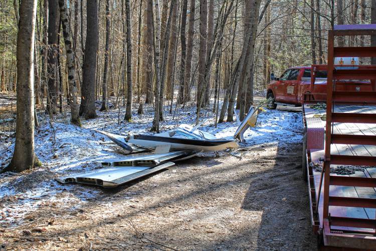 Investigators collect debris and continue investigating a plane crash in the area of Oak Hill Road in Leyden on Jan. 15. The National Transportation Safety Board has released its preliminary report on the crash.