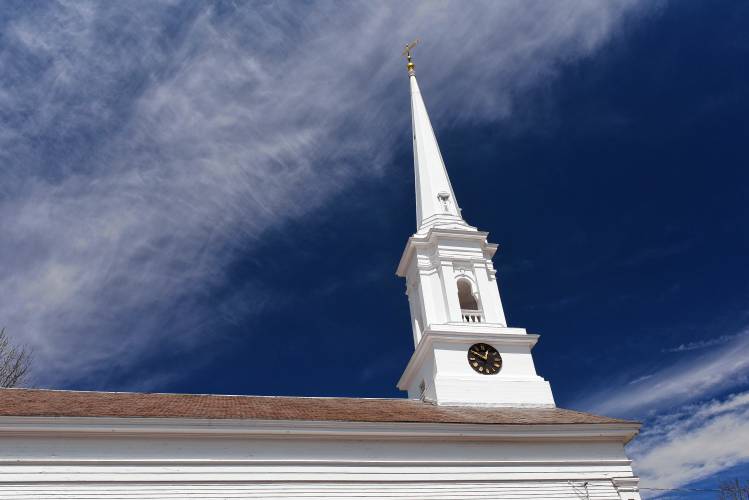 The First Congregational Church of Royalston’s white spire stands out against a blue sky on a recent day.