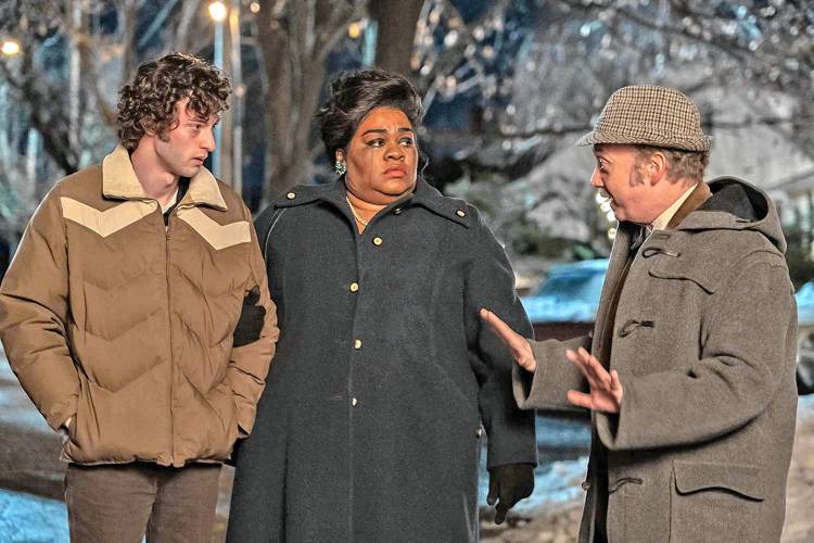 Dominic Sessa, Da’Vine Joy Randolph, and Paul Giamatti star as an unlikely Christmas trio in “The Holdovers.”