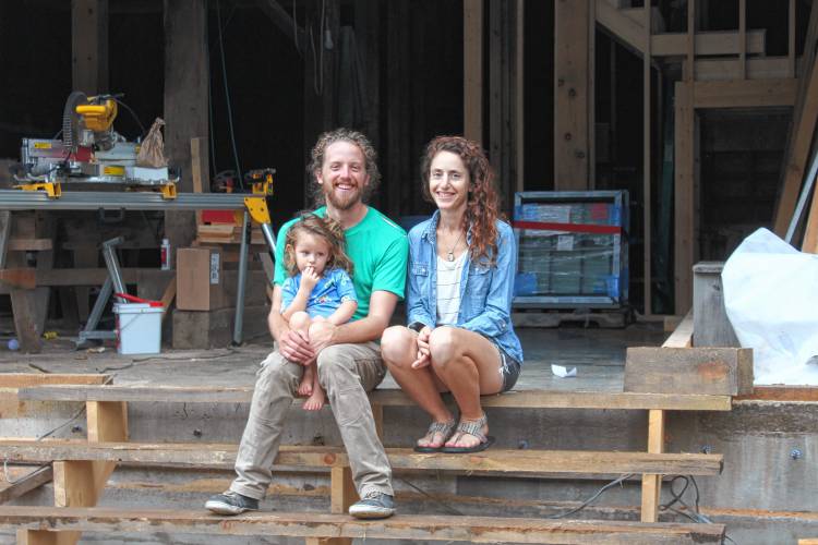 Susan Pincus, Avena Pincus (age 2) and Ryan Richards received an Agricultural Preservation Restriction Improvement Program grant for barn improvements at Brook’s Bend Farm in Montague.