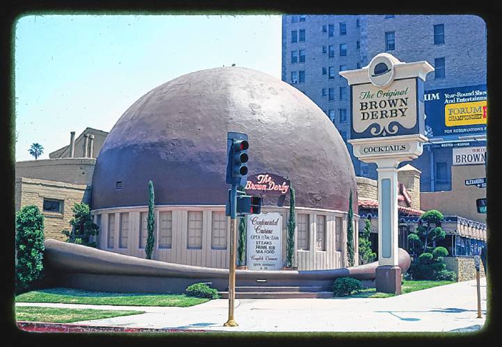The Brown Derby was located close to film and television studios and was known for its movie-star patrons, whose images lined its walls. Clark Gable supposedly proposed to Carole Lombard in one of its booths. It’s also the birthplace of the Cobb salad, invented by the Brown Derby’s owner, Robert Cobb, in 1937.