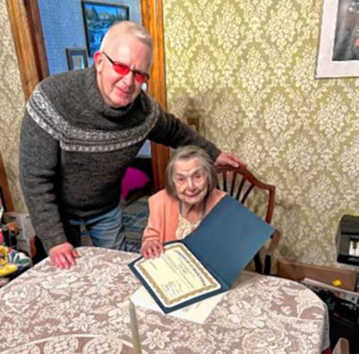 Orange Selectboard Chairman Tom Smith recently bestowed Florence Bickford, 101, with the Boston Post Cane for being the oldest resident in town.