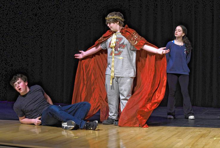 Camden Toponce, Rowan Lewis and Marina Osit rehearse a scene from “Myth Adventures: Five Greek Classics” being put on at Greenfield High School. 
