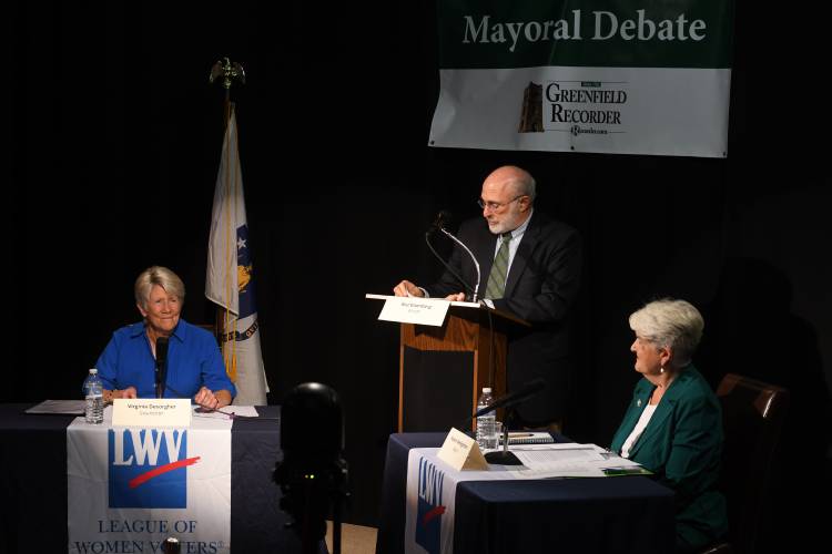 The Greenfield Mayoral Debate between Ginny Desorgher, left, and Roxann Wedegartner, moderated by Stewart “Buz” Eisenberg at Greenfield Community Television studios.