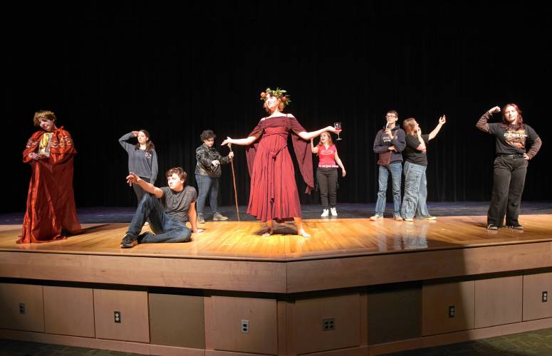 Layla Prescott as Dionysus, center, and other cast members rehearse a scene from “Myth Adventures: Five Greek Classics” being put on at Greenfield High School. 