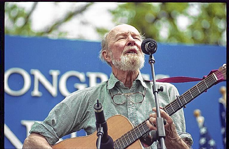 Pete Seeger with guitar singing at the Library of Congress in 2000. A festival to honor his life and work returns to Ashfield next weekend, April 6. The event is a sing-a-long, free and open to all ages. 