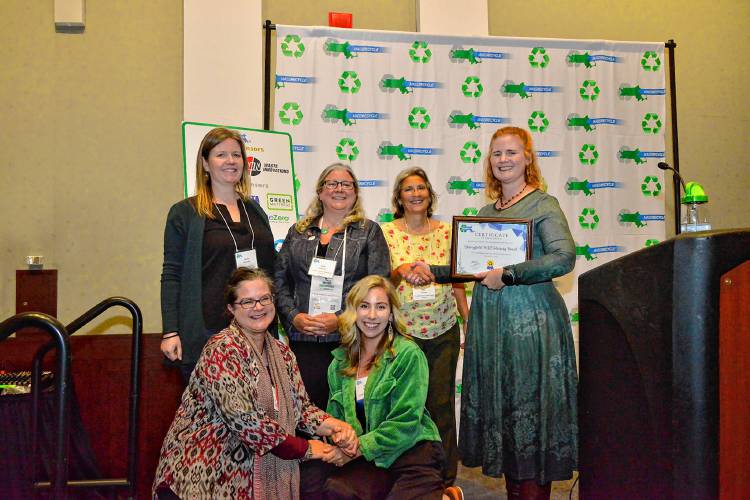 Springfield Materials Recycling Facility Advisory Board members receive the 2023 MassRecycle Award for Outstanding Institution from MassRecycle President Gretchen Carey at Boston’s Hynes Convention Center.