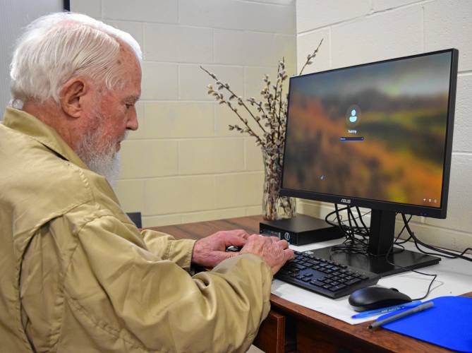 Volunteer Clint Davis uses the Bernardston Senior Center’s new computer lab on Tuesday.