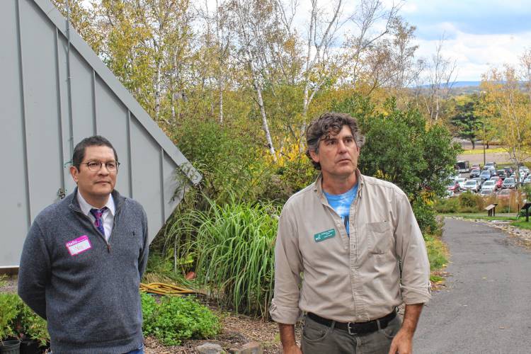 Noe Ortega, left, the state’s higher education commissioner, gets a tour of Greenfield Community College’s Outdoor Learning Lab from Anthony Reiber, who teaches science at the school, on Thursday. Ortega visited the campus to cap off STEM Week on Thursday.