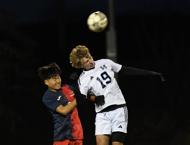Frontier’s Chanmin Son goes up for a header with Monomoy’s Seamus St. Pierre in South Deerfield on Wednesday. 