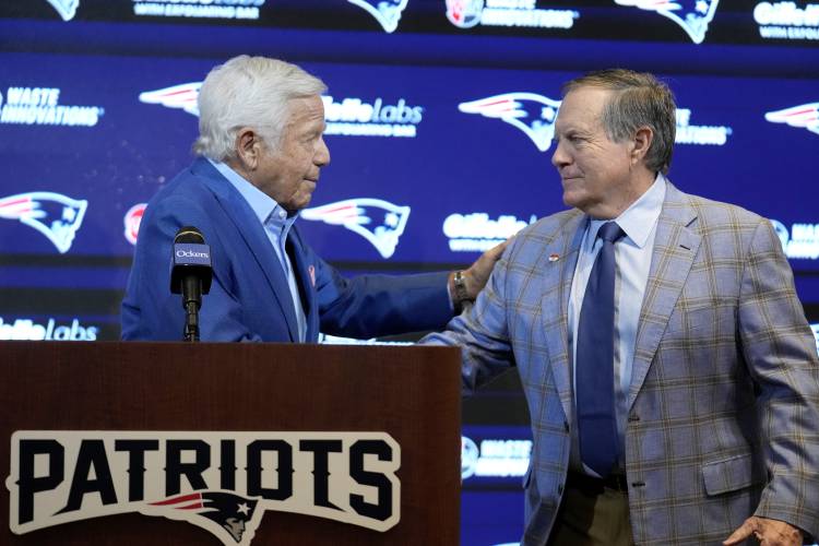 New England Patriots team owner Robert Kraft, left, and former Patriots head coach Bill Belichick shake hands during an NFL football news conference, Thursday, Jan. 11, 2024, in Foxborough, Mass., to announce that Belichick, a six-time NFL champion, has agreed to part ways with the team. (AP Photo/Steven Senne)
