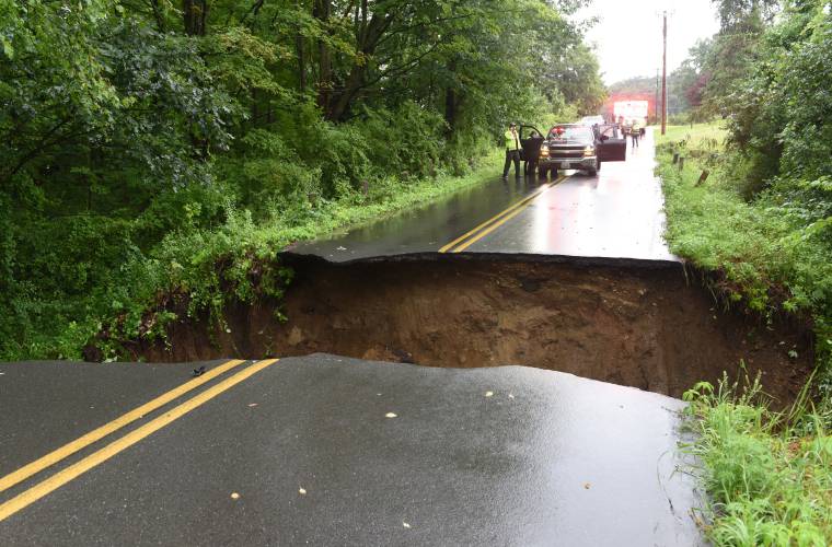 Heavy rains dramatically washed out a section of Lower Road in Deerfield, seen on July 28.
