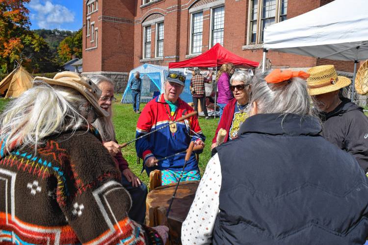 A drumming group at the Indigenous Peoples Celebration at the Shelburne Historical Society in 2022.
