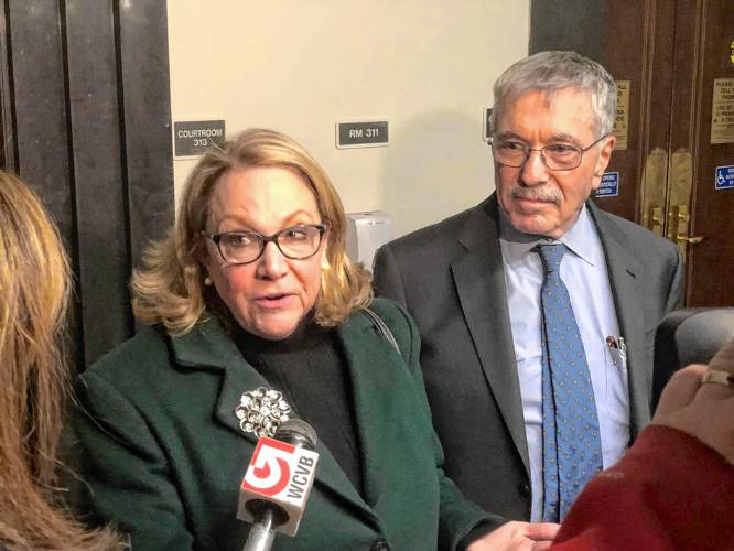 Suspended Cannabis Control Commission Chair Shannon O’Brien and her lawyer, Max Stern, spoke with reporters after a Dec. 14, 2023 hearing in Suffolk County Superior Court.