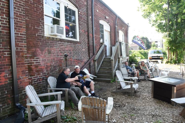 Outdoor seating at Pioneer Valley Brewery on Third Street in Turners Falls, pictured in July 2023.