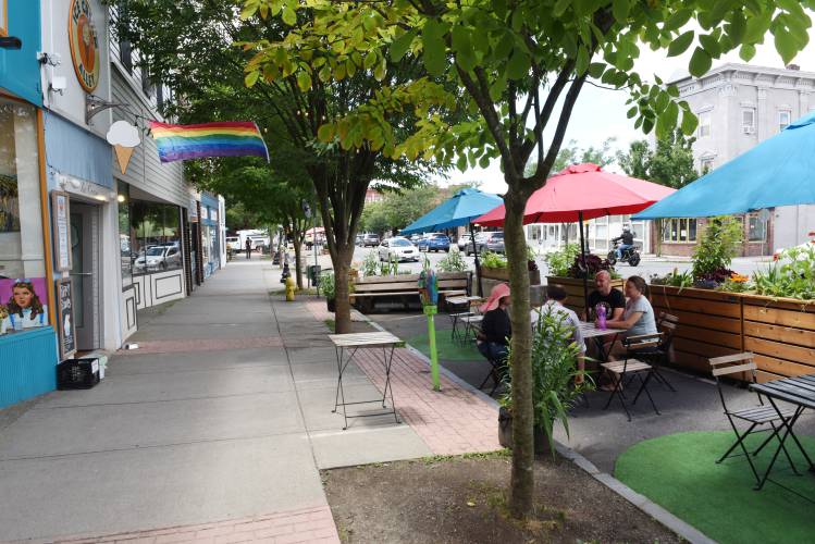 Outdoor seating at Ice Cream Alley in Greenfield, pictured in July 2023.