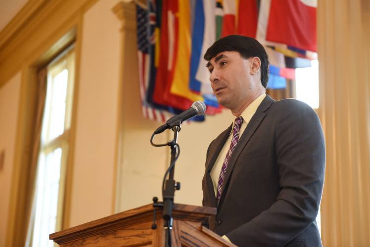 Greenfield Recorder Citizen of the Year Ben Clark speaks at the Franklin County Chamber of Commerce’s breakfast at Deerfield Academy earlier this month.