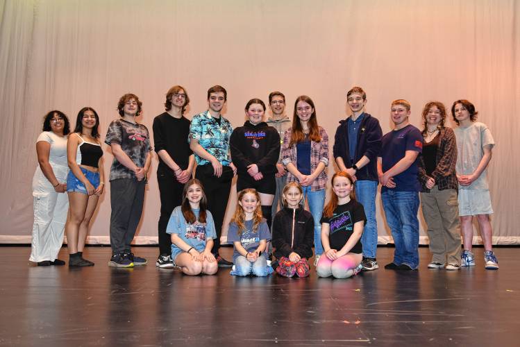 The cast of “Frozen Jr.” on stage during rehearsal at Ralph C. Mahar Regional School in Orange.