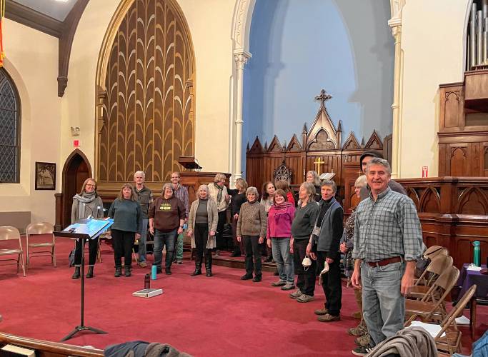 Members of the Eventide Singers pose for a photo during a rehearsal at the Second Congregational Church of Greenfield.