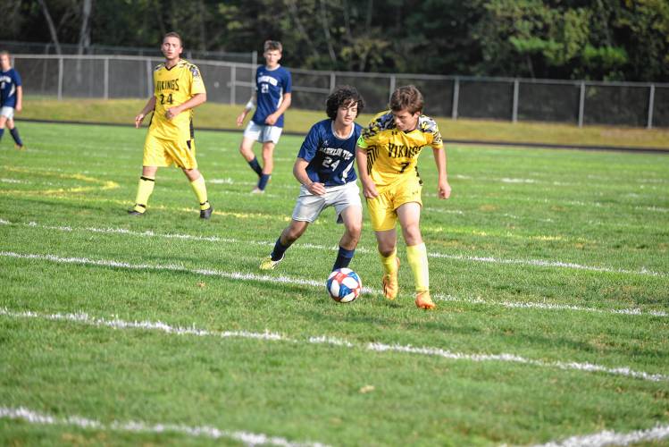Smith Vocational’s Sean Zadworny dribbles while defended by Franklin Tech’s Jon Peters on Friday in Turners. 