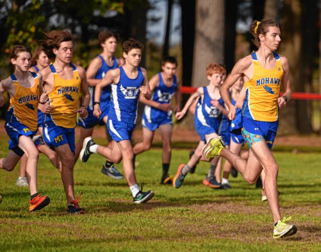 Mohawk Trail’s Vincent Gauthier, right, leads a pack of runners at the start of Tuesday’s cross country meet in Orange. Gauthier finished second overall to pace the Warriors. 