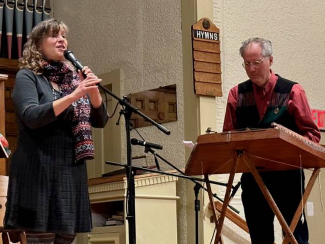 Christy Grecsek shares a poem alongside Tim Van Egmond on hammer dulcimer at the 38th annual Solstice Storytelling and Songfest Celebration held at the First Congregational Church of Ashfield in 2022. Both Grecsek and Van Egmond will participate in the 39th annual event on Saturday.