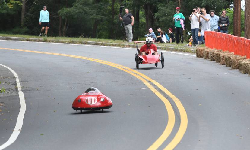 Eventual winner Jim Roberge of Greenfield pulls ahead in the Greenfield Soapbox Derby in 2021.