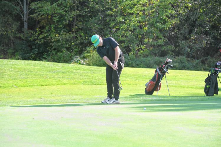 Greenfield’s Preston Lafleur putts on Hole No. 2 during a match against Athol at the Country Club of Greenfield on Wednesday.