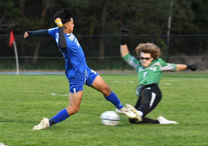 Turners Falls’ Yolvin Ovalle-Mejia has his shot blocked by Holyoke goalie Landon Koziara at the Bourdeau Fields Complex in Turners Falls on Tuesday evening. 