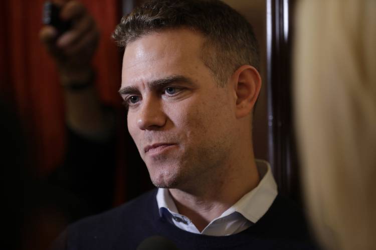 Theo Epstein speaks to reporters during the Major League Baseball General Manager Meetings in 2018 in Carlsbad, Calif. 
