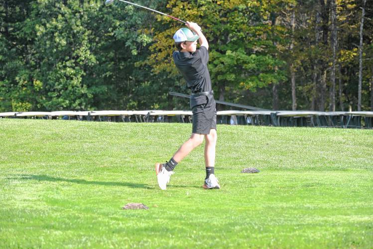 Greenfield’s Conner Bergeron tees off on Hole No. 1 during a match against Athol at the Country Club of Greenfield on Wednesday.