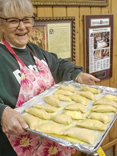 St. Hyacinth Pierogi Maker Denise Hitchcock displays a tray of pierogies that will be available at Our Lady of Czestochowa Church’s Easter Bazaar in Turners Falls on Saturday, March 23.