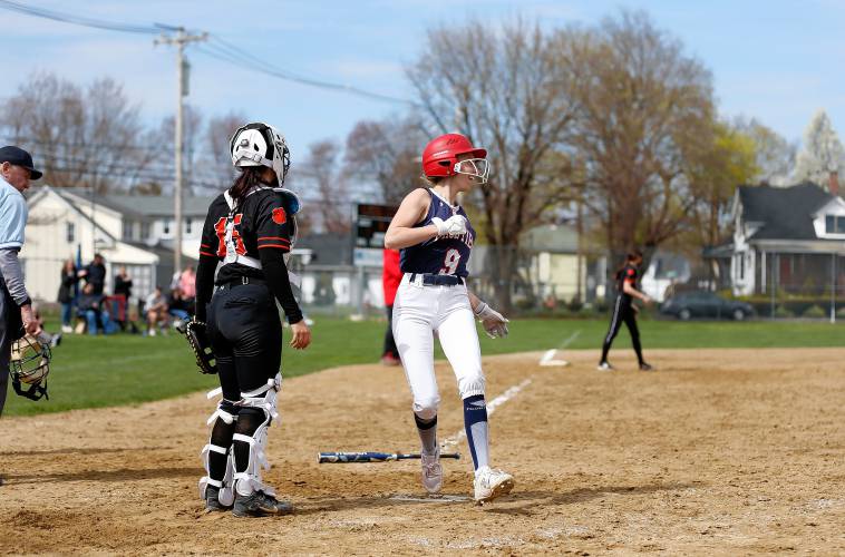 Frontier baserunner Olivia Machon (9) crosses home plate to score against South Hadley in the top of the sixth inning Friday in South Hadley.